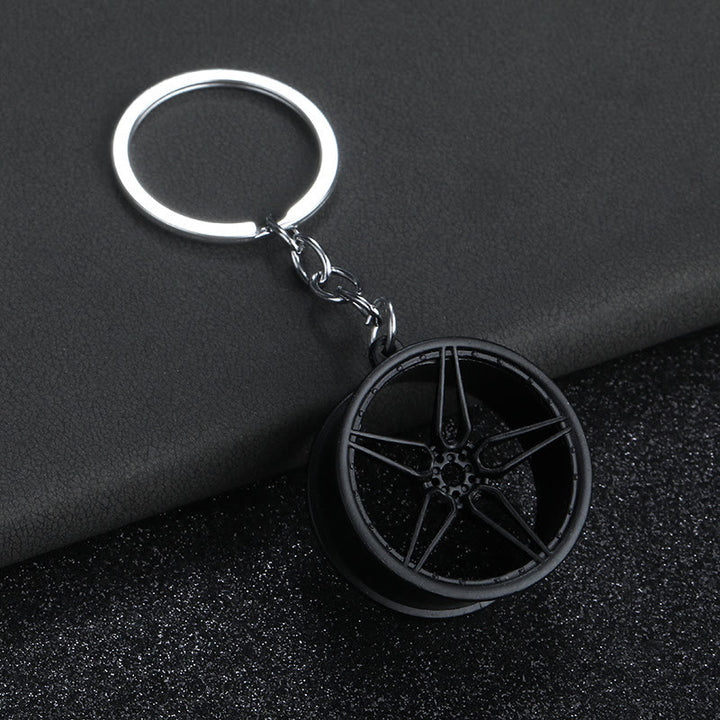 Collection de porte-clés au design de pièces automobiles modernes miniatures - Grande Roue Noire - image 10