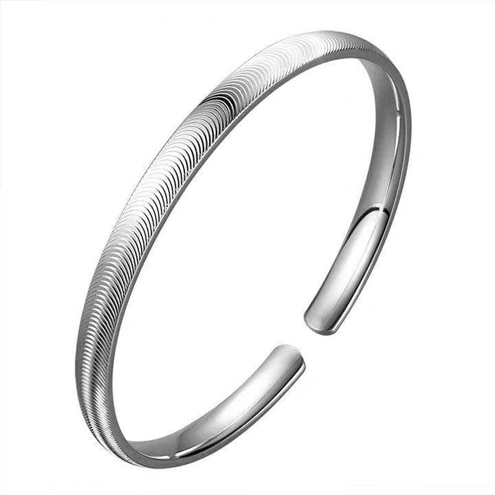 Bracelet manchette ouvert en argent, design minimaliste inspiré des vagues - image 8