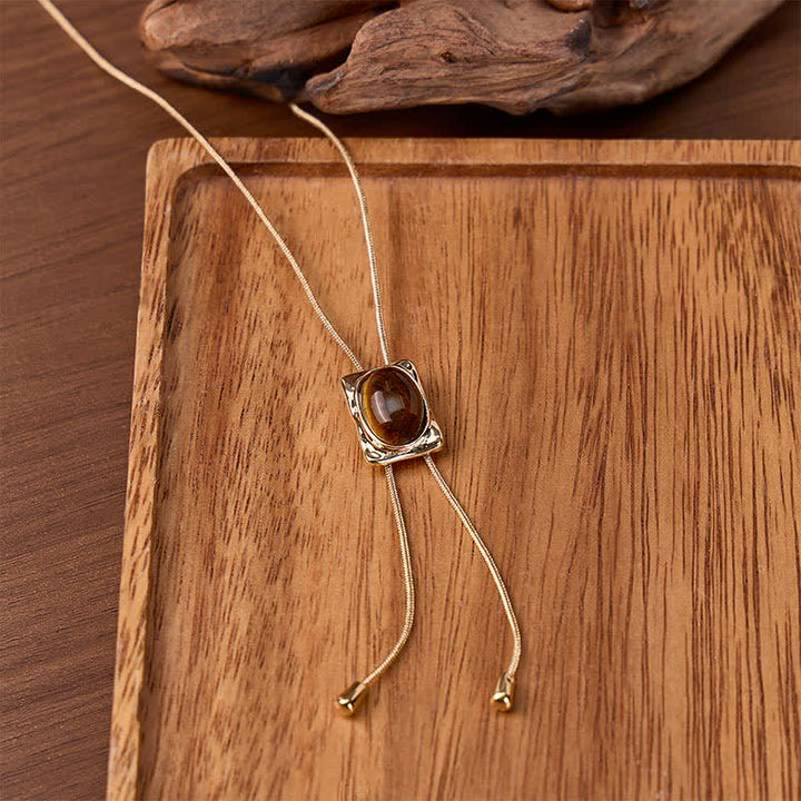 Collier bolo à pendentif carré coulissant œil de tigre en forme de Y - Or - image 0