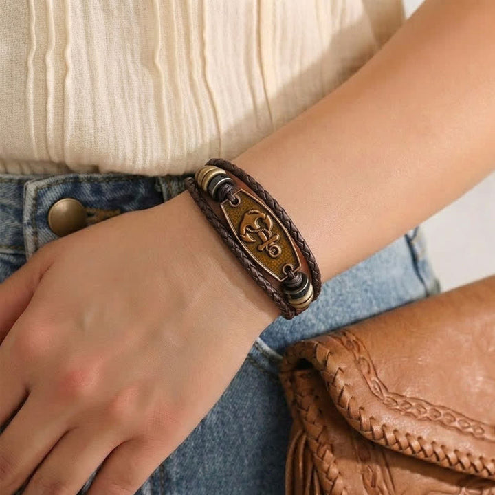 Bracelet vintage en bronze antique et cuir tressé multicouche - image 1