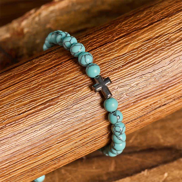 Bracelet ajustable en perles turquoise avec croix de la foi - image 1