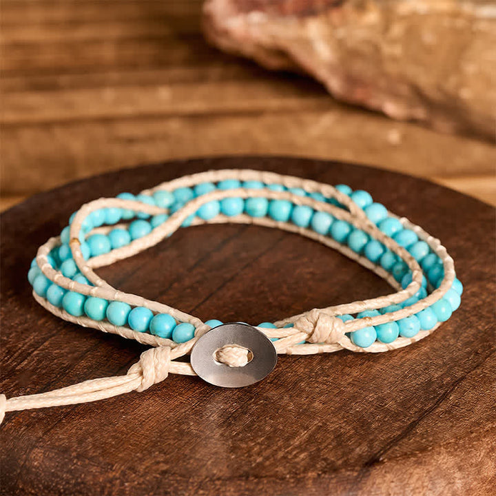 Bracelet double tour épuré en perles turquoise avec cordon beige - image 2