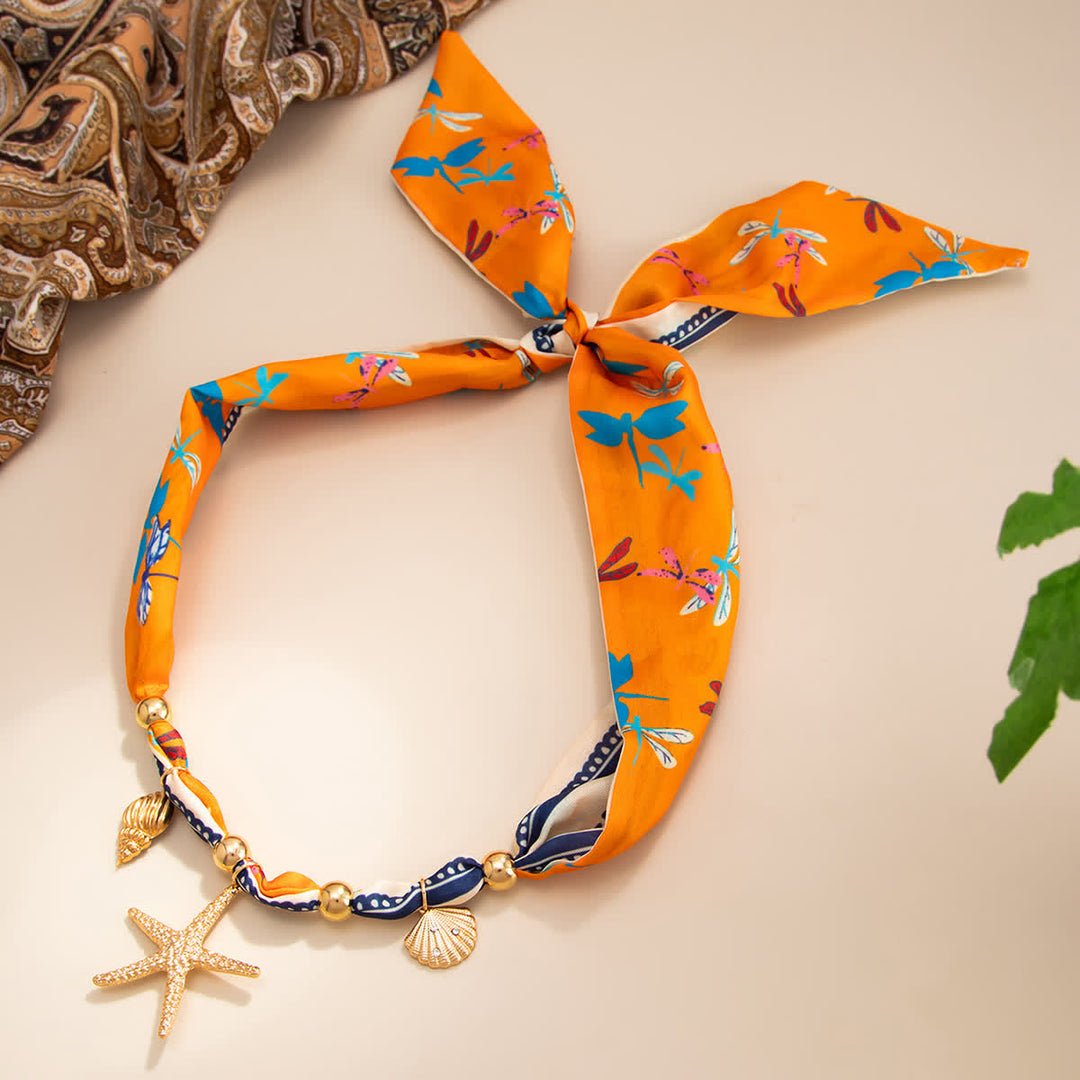 Écharpe/collier avec pendentif étoile de mer orange, coquillage et libellule - image 1