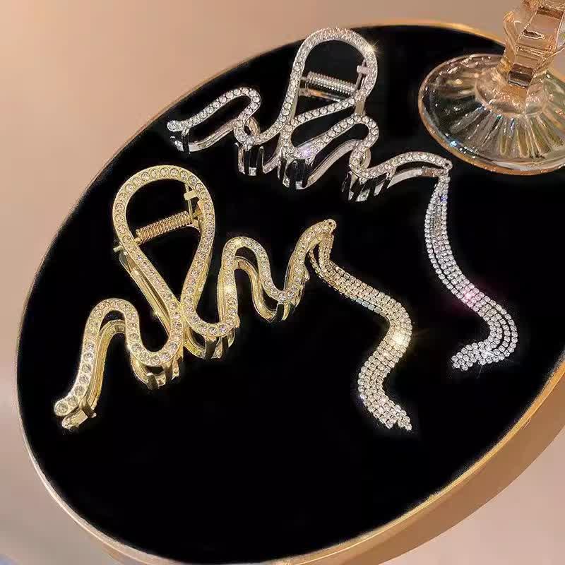 Pince à cheveux pour femme en forme de serpent sirène ornée de strass et de pompons en cristal - image 0