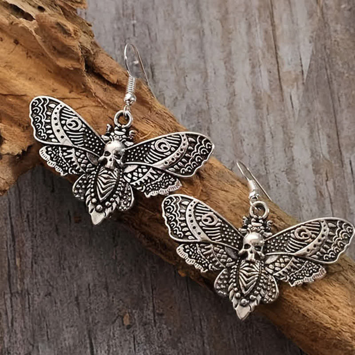 Boucles d'oreilles gothiques vintage envoûtantes, motif papillon de nuit et crâne - Argent - image 0