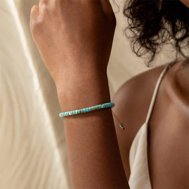 Bracelet ajustable à perles turquoise et cordon - image 1