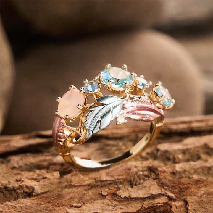 Bague femme imposante ornée d'une plume en émail et de cristaux - image 3
