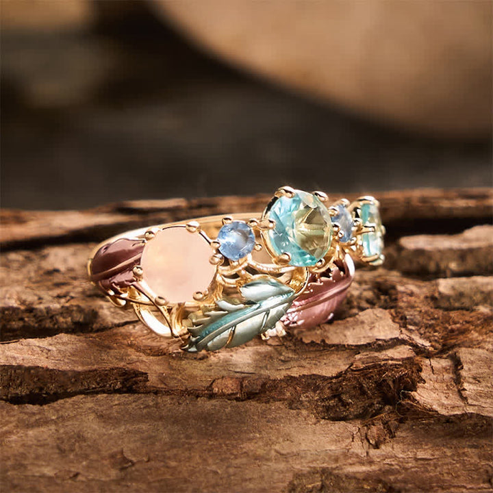 Bague femme imposante ornée d'une plume en émail et de cristaux - image 4
