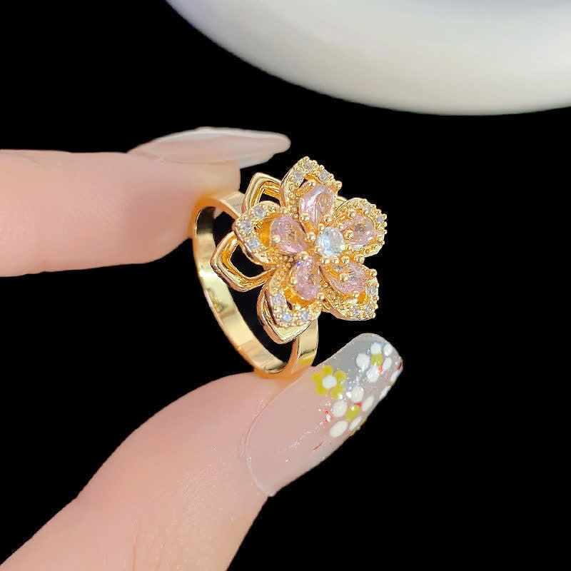 Bague anti-anxiété rotative en zircon et fleur de sakura - image 0