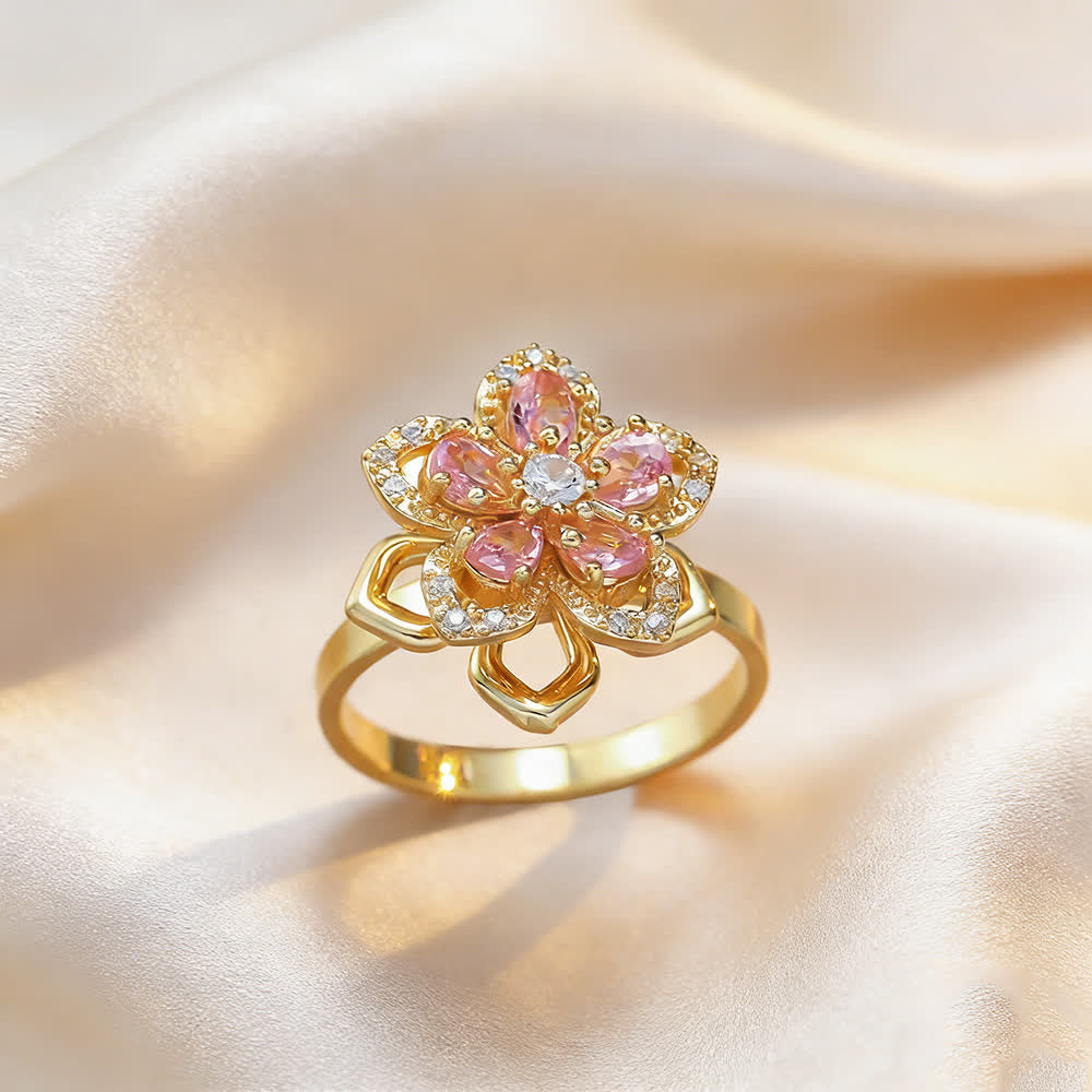 Bague anti-anxiété rotative en zircon et fleur de sakura - Rose et or - image 1