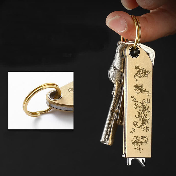 Porte-clés couteau pliant compact et élégant en laiton doré à motif - image 1