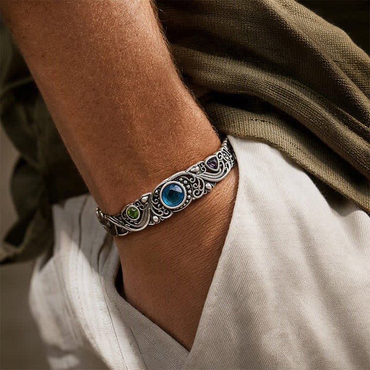 Bracelet manchette ajouré orné de pierres précieuses - image 1