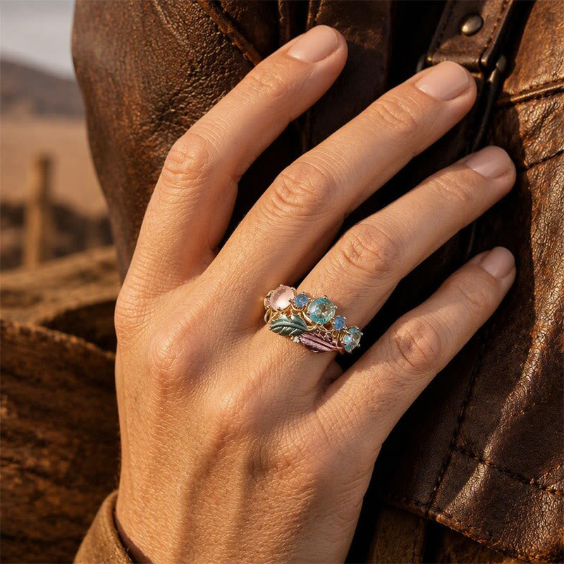 Bague femme imposante ornée d'une plume en émail et de cristaux - image 1