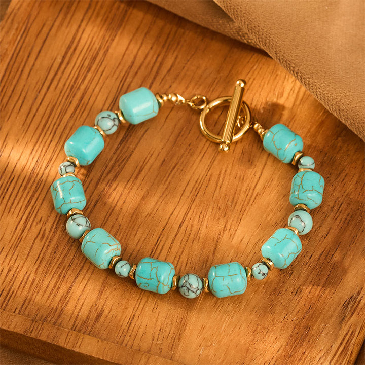 Bracelet vintage bohème en perles turquoise et métal doré - image 1