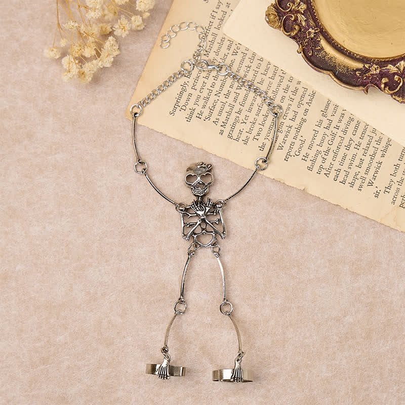 Bracelet d'Halloween avec chaîne main squelette et anneaux - image 2