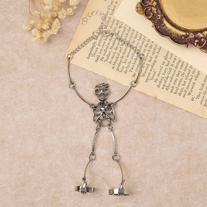 Bracelet d'Halloween avec chaîne main squelette et anneaux - image 2