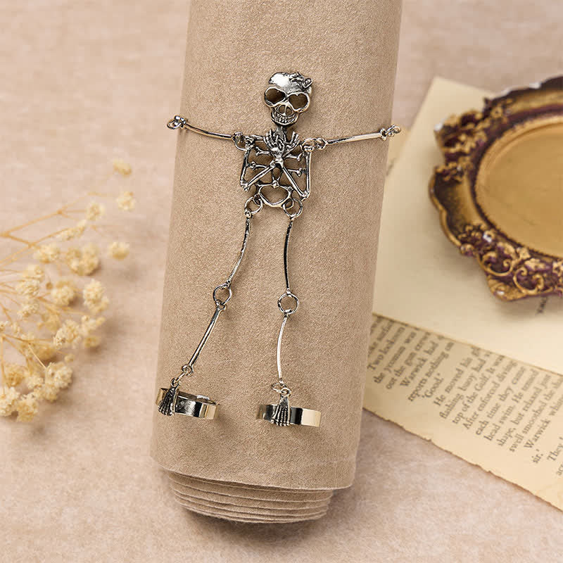 Bracelet d'Halloween avec chaîne main squelette et anneaux - image 1