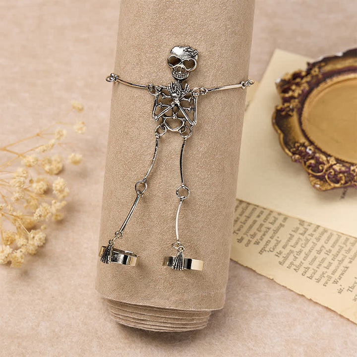 Bracelet d'Halloween avec chaîne main squelette et anneaux - image 1