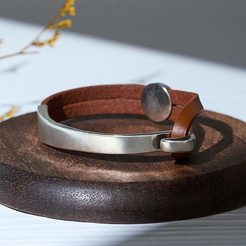 Bracelet minimaliste moderne pour homme, en métal et cuir. - image 6