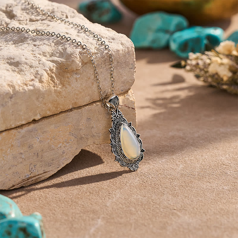 Collier pendentif vintage en filigrane en forme de larme et pierre de lune - image 3