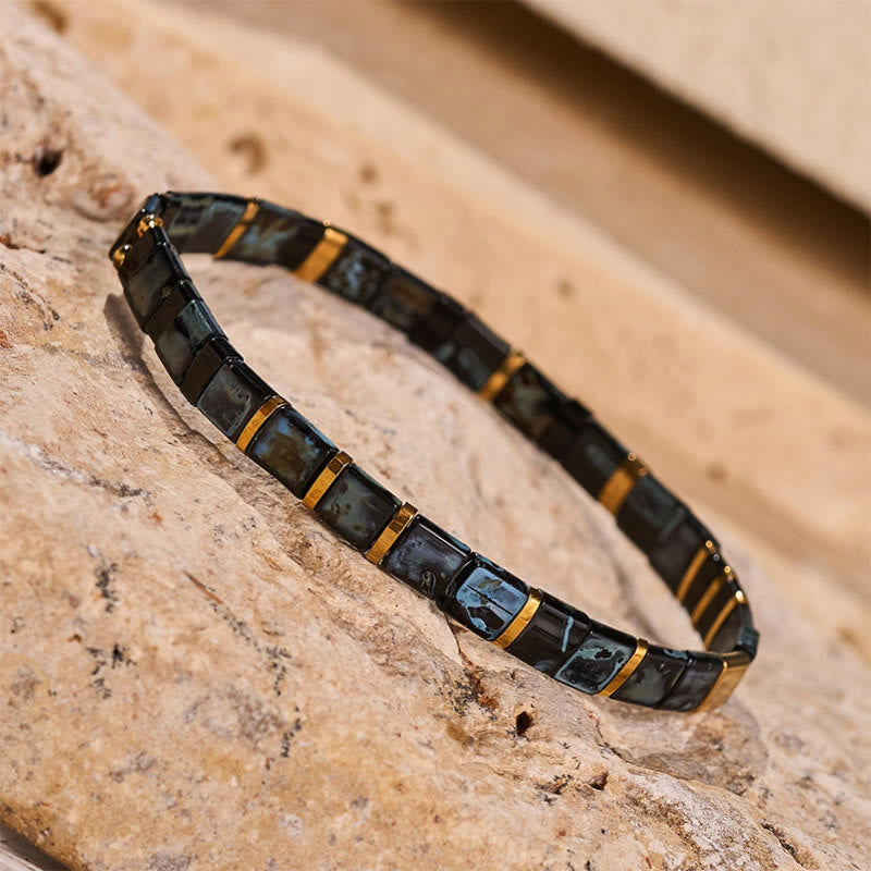 Bracelet vintage en perles Tila noires et dorées - image 4
