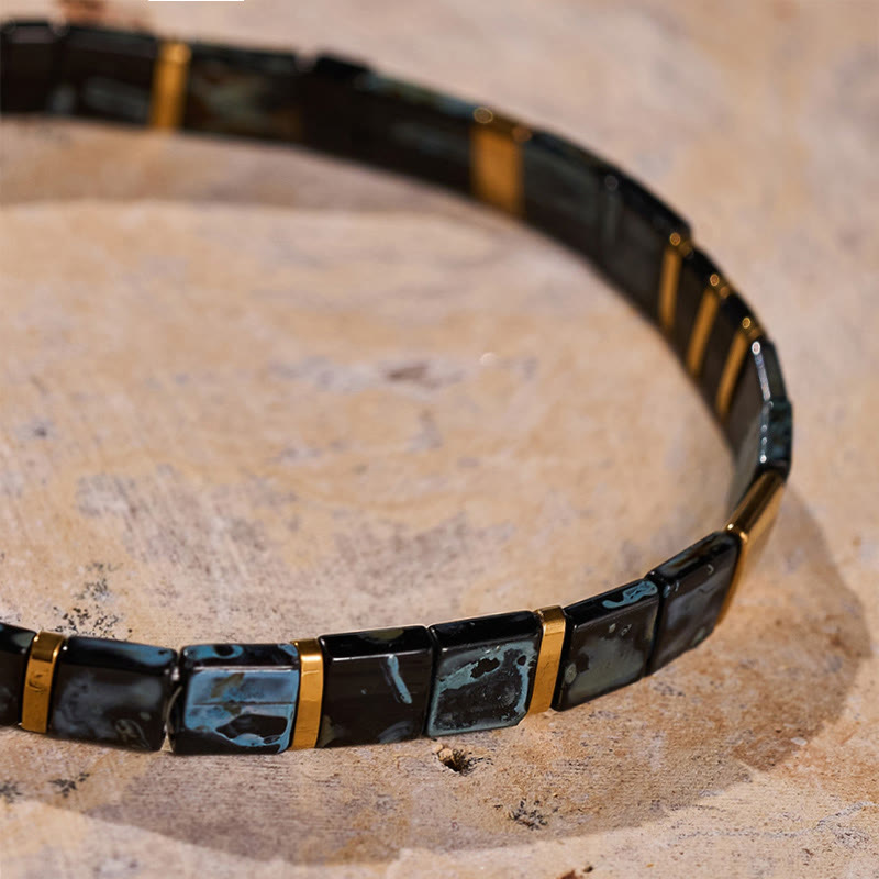 Bracelet vintage en perles Tila noires et dorées - image 5