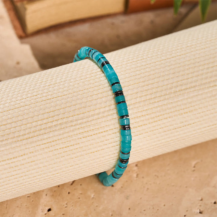 Bracelet minimaliste apaisant à perles carrées turquoise - image 6