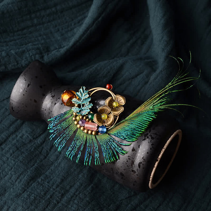 Broche rétro en bronze avec plume de paon et fleur pour femme