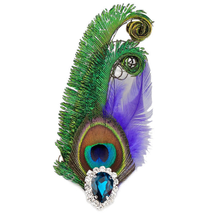 Broche en strass avec plumes d'oeil de paon