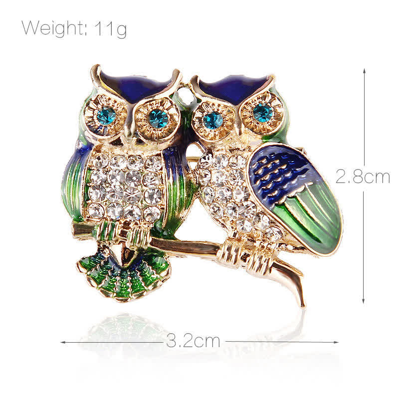 Broche pour femme avec deux hiboux sur une branche