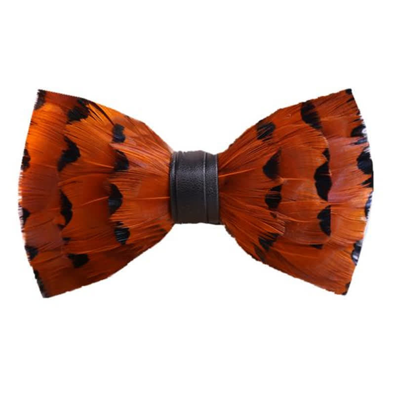 Nœud papillon en plumes de queue de pinson orange vif avec épingle à revers