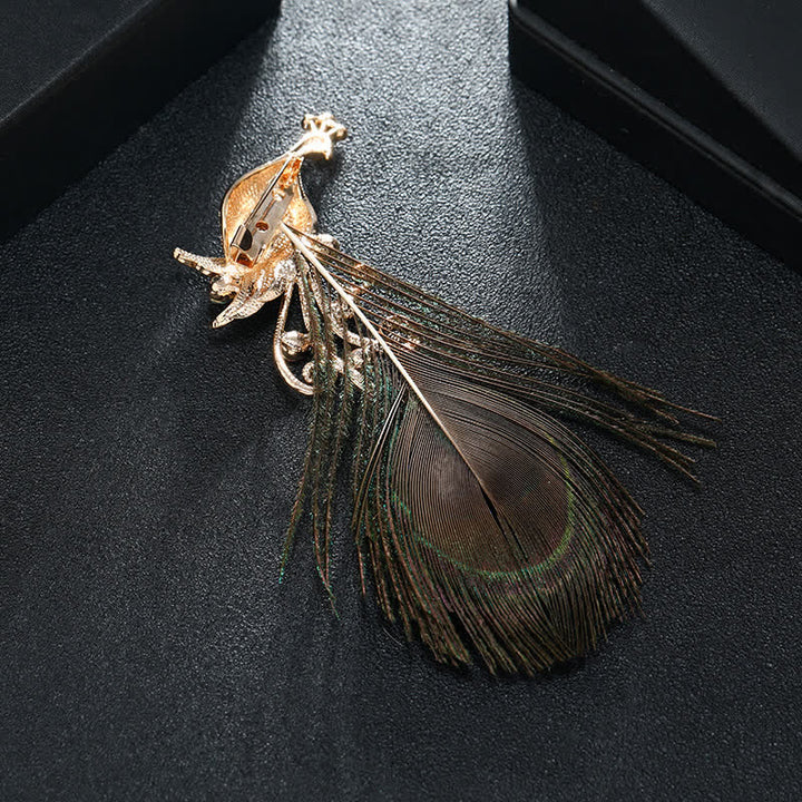 Broche ethnique en plumes de paon colorées pour femme