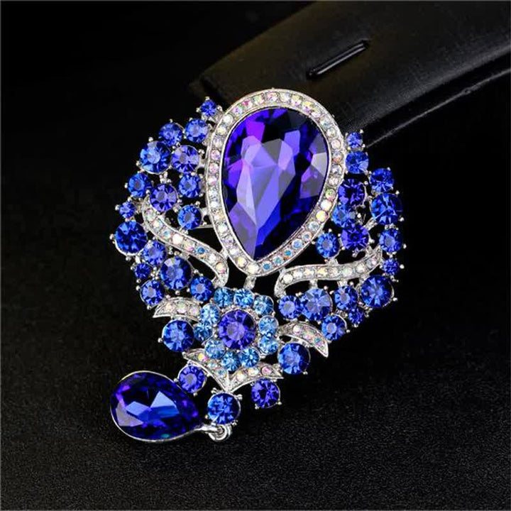 Broche en forme de goutte d'eau en verre transparent pour femme