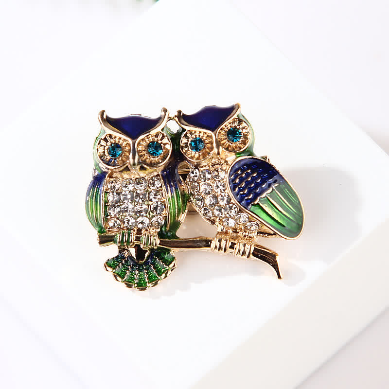 Broche pour femme avec deux hiboux sur une branche