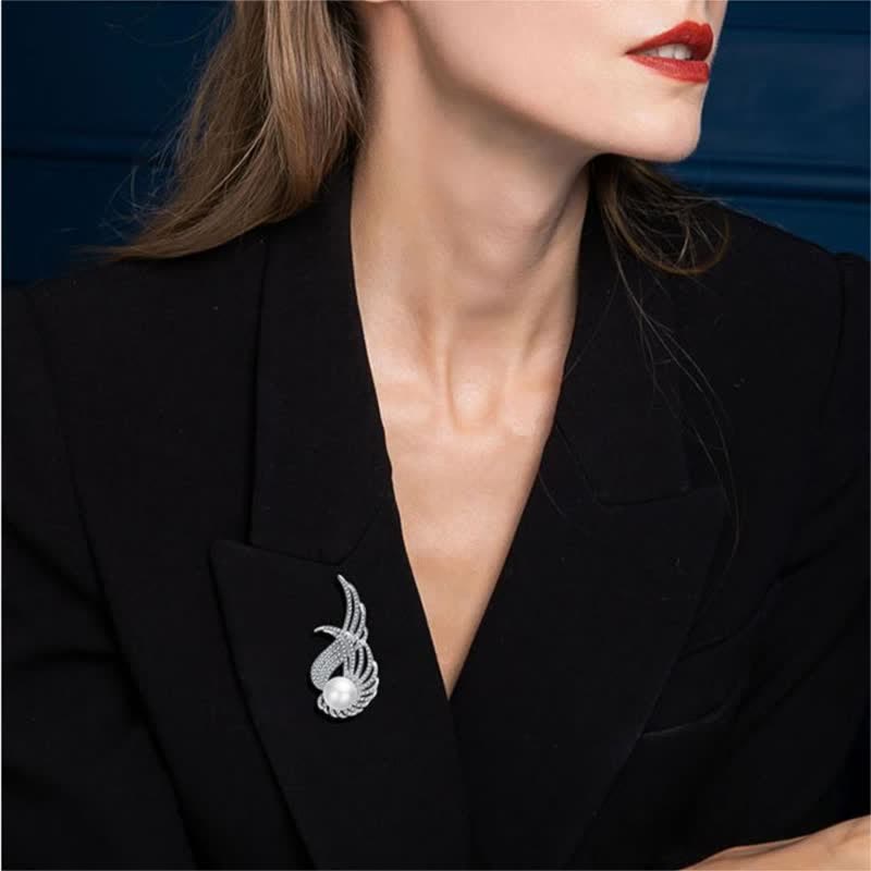 Broche en perles et plumes d'ailes d'ange pour femme