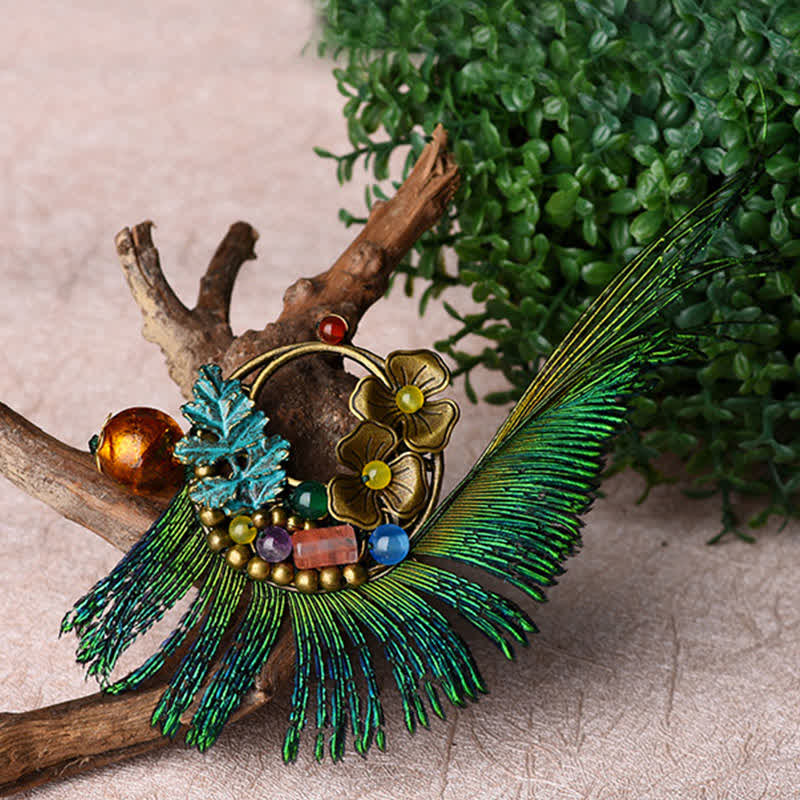 Broche rétro en bronze avec plume de paon et fleur pour femme
