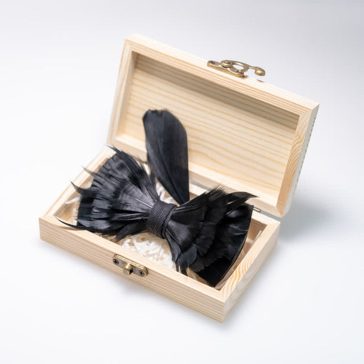 Nœud papillon en plumes noires unies pour enfant avec épingle à revers
