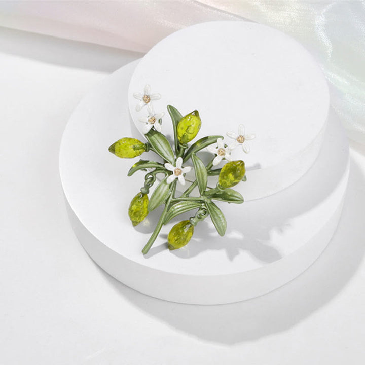 Broche pour femme en forme de goutte de citron et de plante verte