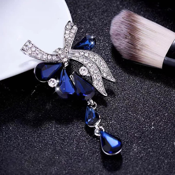 Broche fantaisie en forme de nœud papillon en forme de larme pour femme