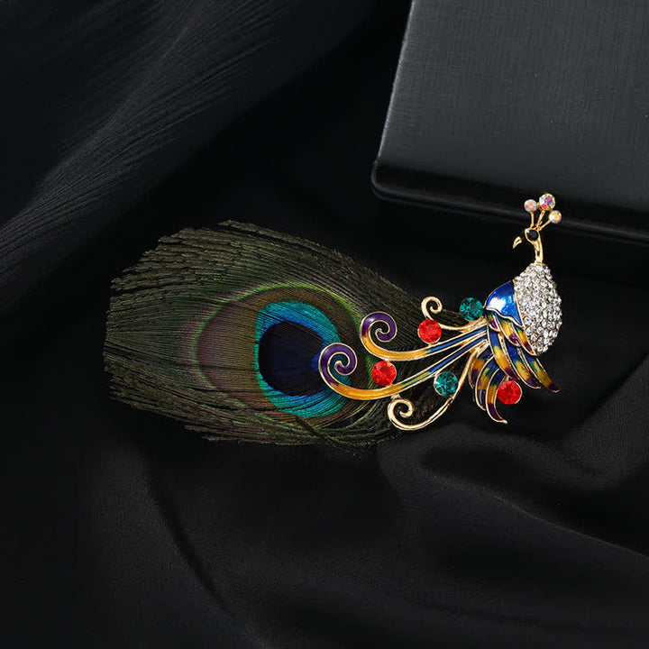Broche ethnique en plumes de paon colorées pour femme