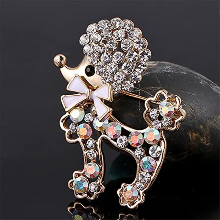 Broche pour femme en forme de chiot caniche avec noeud papillon