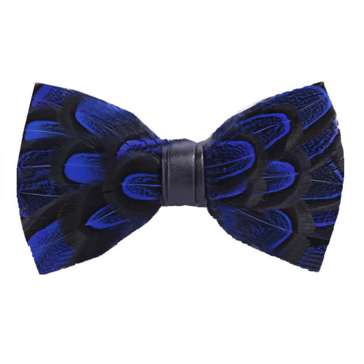 Nœud papillon en plumes de paon bleu nuit et noir avec épingle à revers