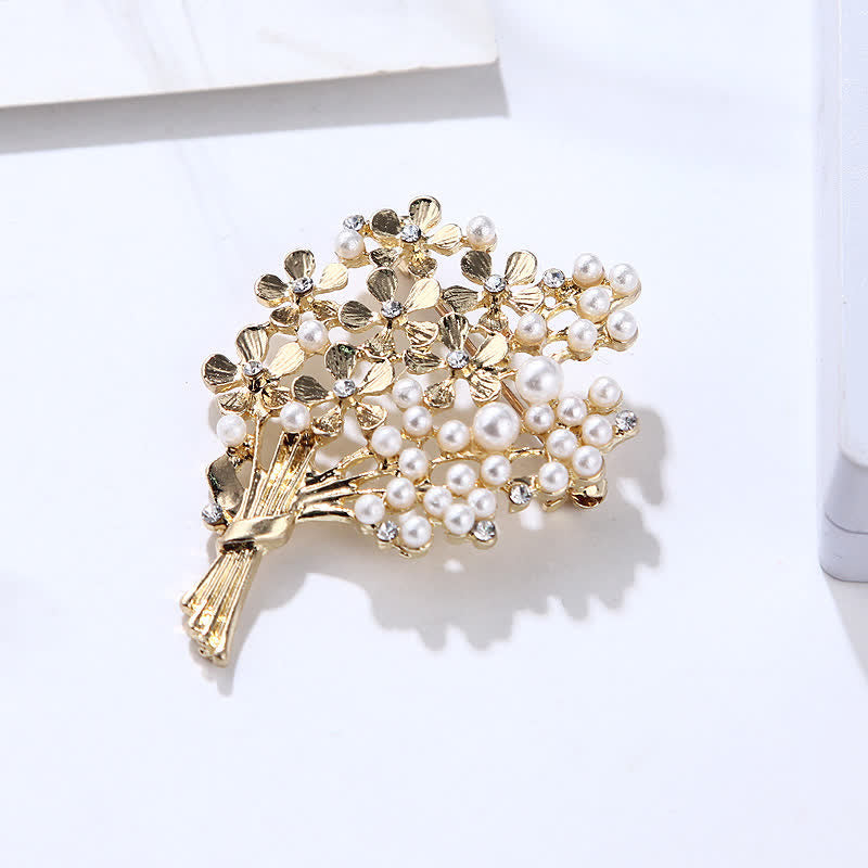 Broche pour femme en perles et fleurs dorées