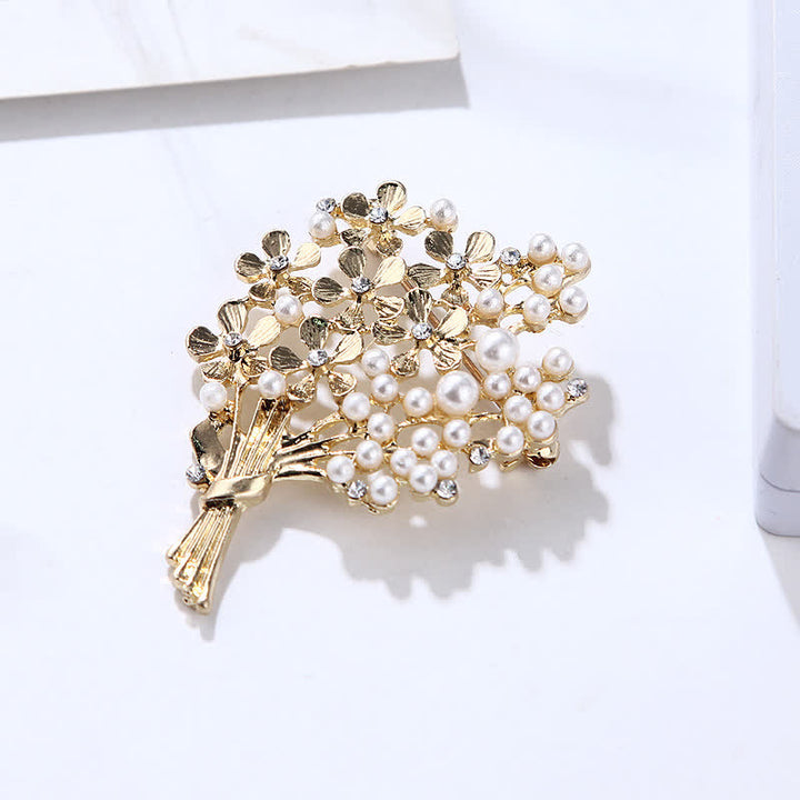 Broche pour femme en perles et fleurs dorées
