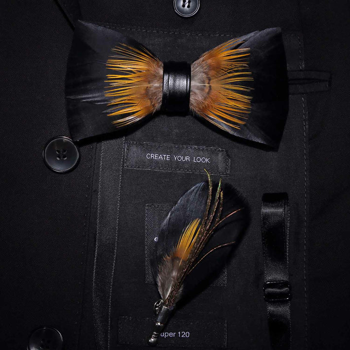 Nœud papillon en plumes de tournesol orange et noir avec épingle à revers