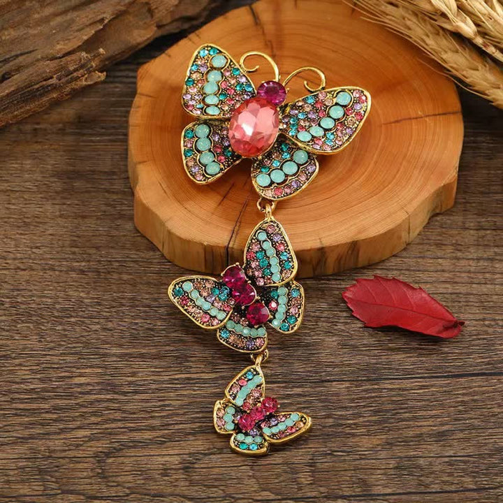 Broche ludique à trois papillons pour femme