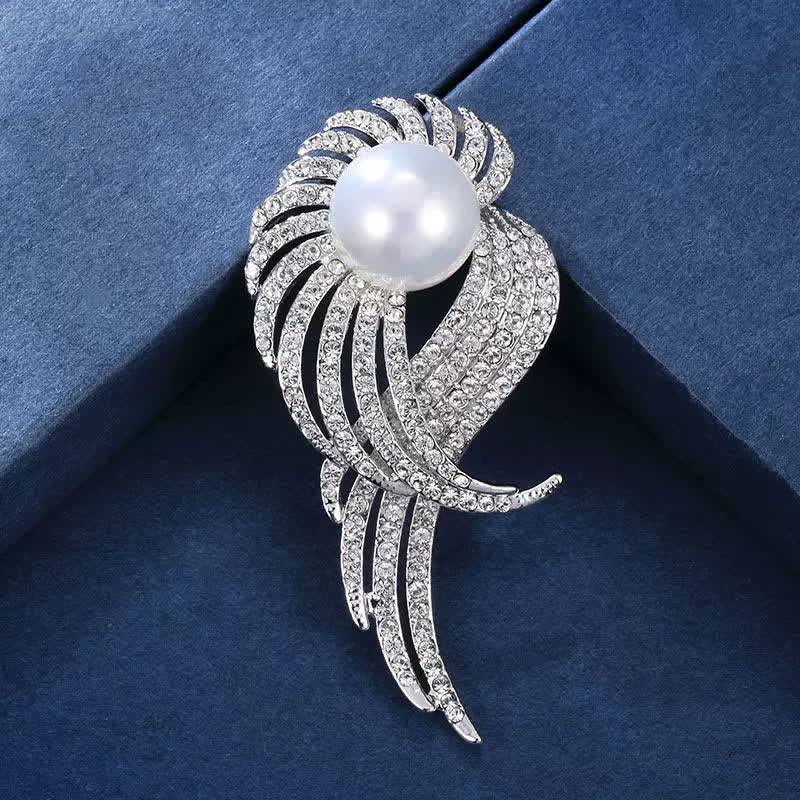 Broche en perles et plumes d'ailes d'ange pour femme