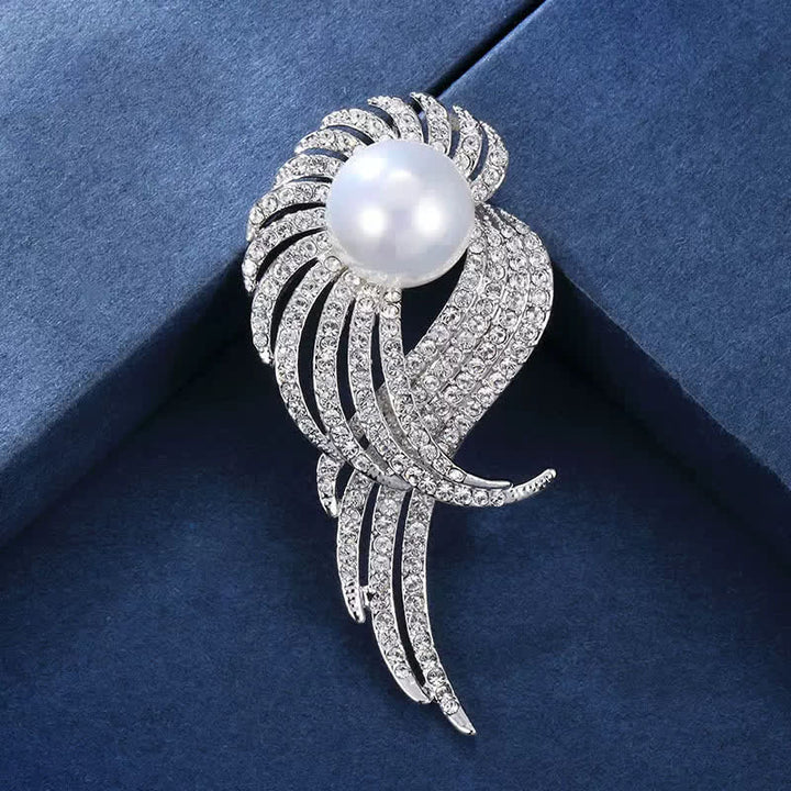 Broche en perles et plumes d'ailes d'ange pour femme