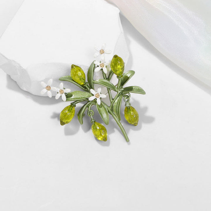 Broche pour femme en forme de goutte de citron et de plante verte