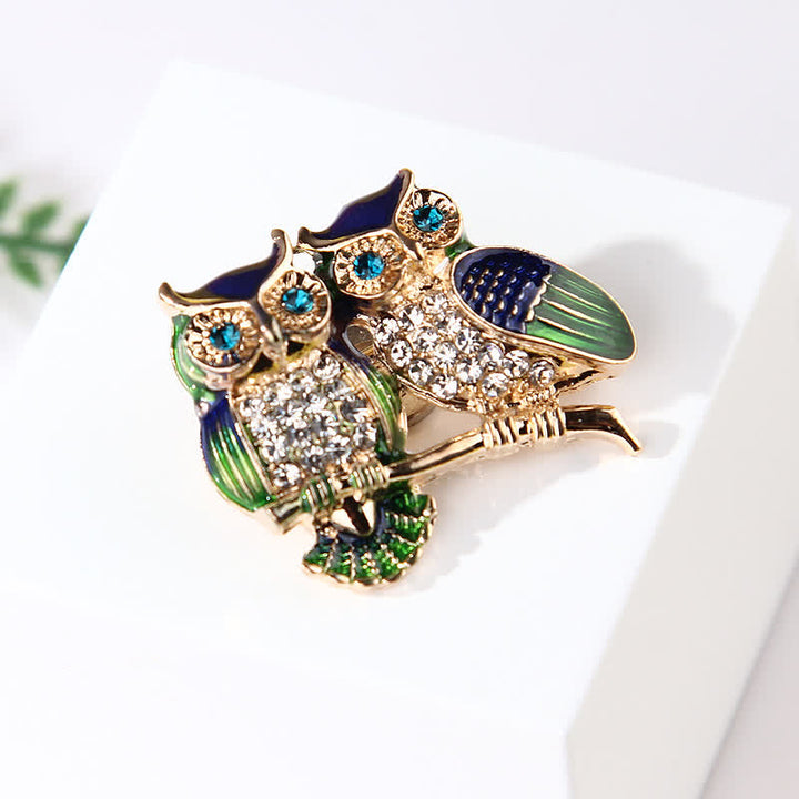 Broche pour femme avec deux hiboux sur une branche